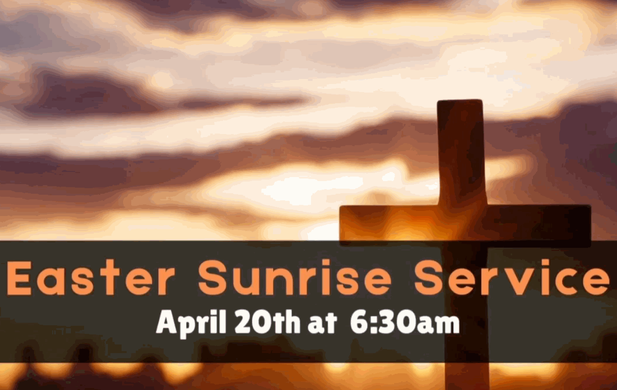 Cross in front of the sunrise